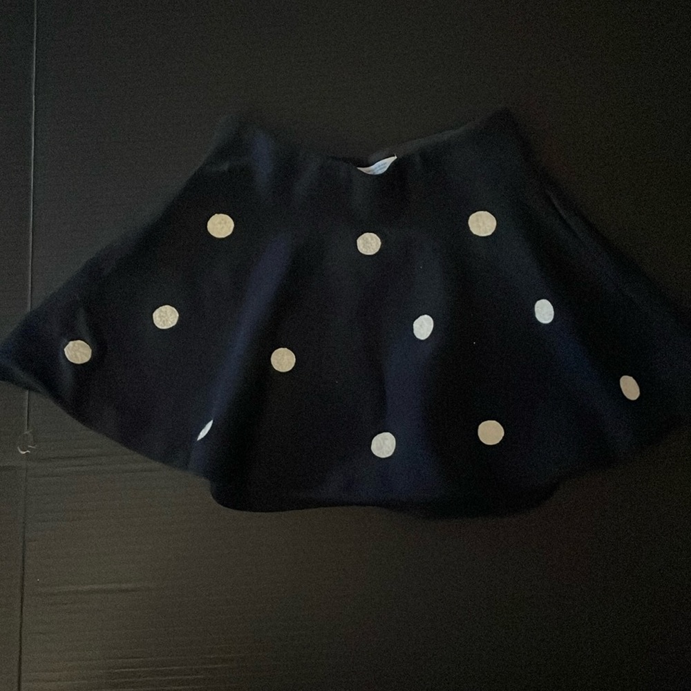 Girls blue skirt with white polkadots